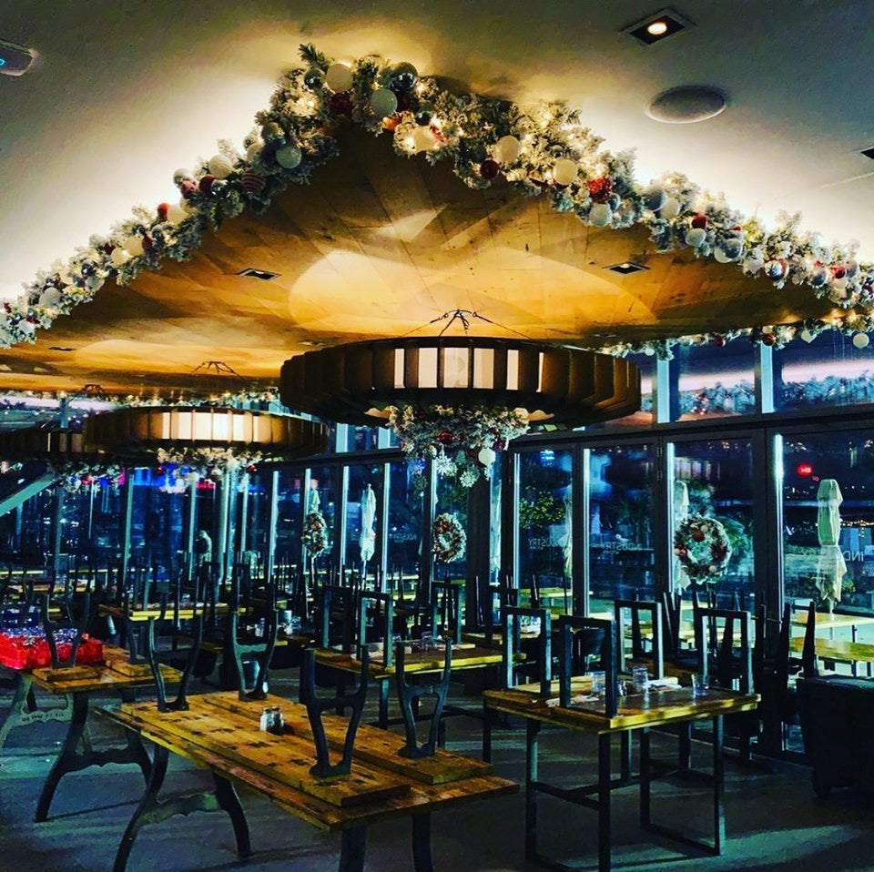 Flocked and decorated Christmas decorations by Rent-A-Christmas at Industry Kitchen 2018, NYC