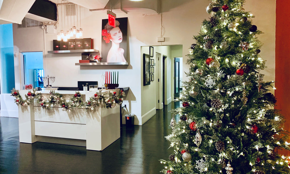 A professionally decorated Christmas Tree and other holiday decor showcase the benefits of decorating a business for the holidays.