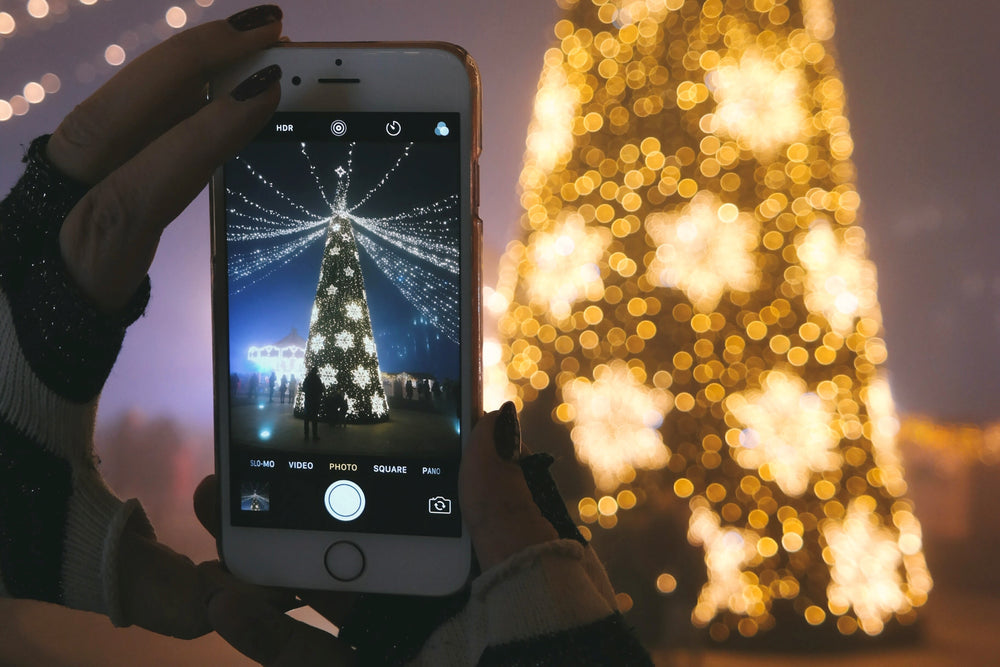 iphone photo of Giant outdoor Christmas decors, pre-lit commercial Christmas tree, and jumbo snowflake lights