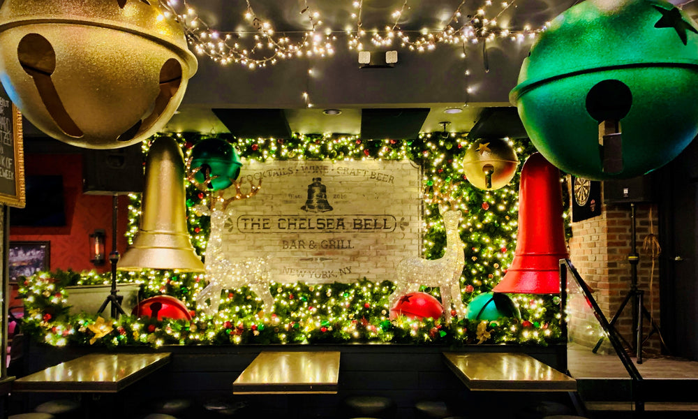 The Chelsea Bell in NYC features some of the best holiday decor for Christmas with oversized bells, greenery walls and reindeer