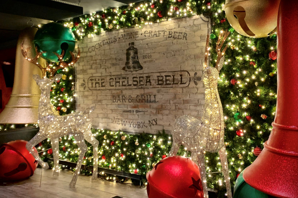 The Chelsea Bell - Top Christmas Restaurant Holiday Decorations NYC - Stage with lights, Bells, Reindeer
