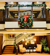 A wreath and garland decorated balcony