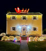A two-story house complete with Santa's Sleigh on top!