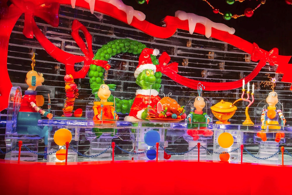 Ice! holiday display at Gaylord Palms in Florida depicts scene from Dr Seuss' How The Grinch Stole Christmas with a big Christmas Feast