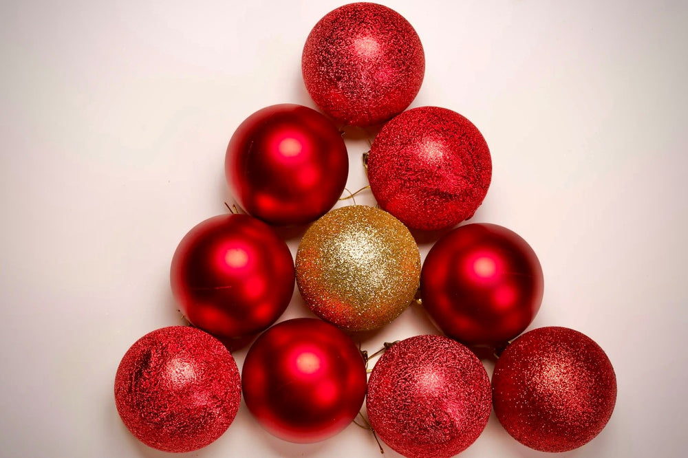Red & Gold Christmas Baubles Stacked to make a Christmas Tree Shape - Holiday Decorations